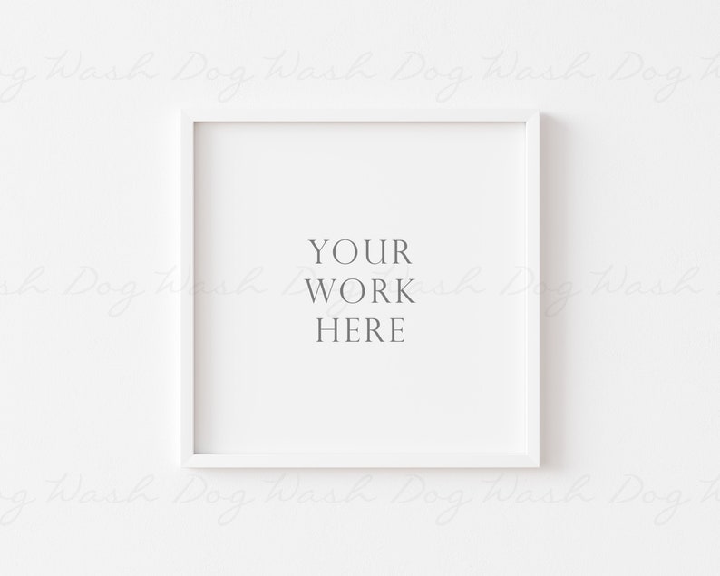 May include: A square white picture frame with the text "YOUR WORK HERE" in the center. The frame is set against a plain white background, creating a clean and minimalist aesthetic. Ideal for displaying artwork or photography.