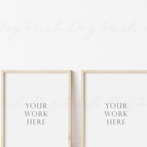 May include: Three wooden picture frames with white mats and the text "Your Work Here" in each frame.