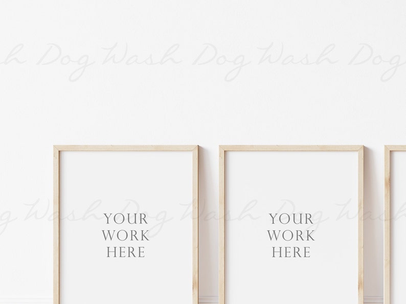 May include: Three wooden picture frames with white mats and the text "Your Work Here" in each frame.