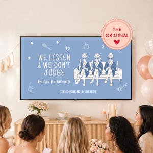 May include: A television screen displays a light blue graphic with white line art of three people in robes and sunglasses sitting on a sofa holding glasses. Text reads: WE LISTEN & WE DON'T JUDGE, Emily's Bachelorette, GIRLS GONE MILD EDITION.