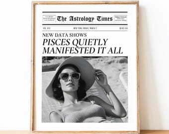 May include: A framed wall art print styled as a newspaper titled The Astrology Times. The headline reads New Data Shows Pisces Quietly Manifested It All. Below the text is a black and white photograph of a person wearing a wide-brimmed hat.