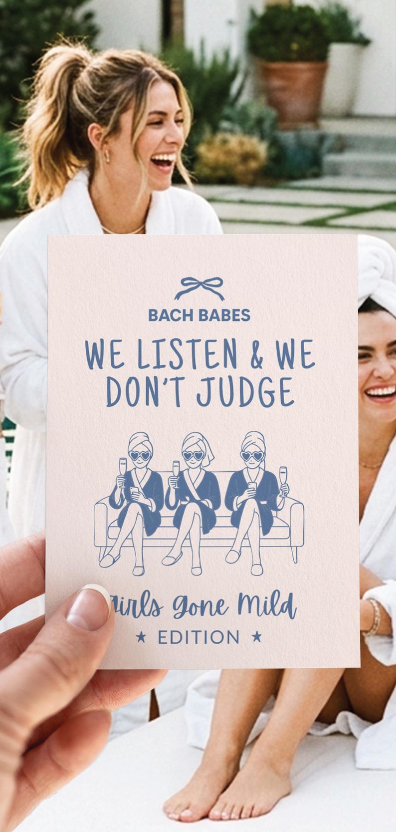 May include: A greeting card with the text "Bach Babes We Listen & We Don't Judge" and "Girls Gone Mild Edition". The card features a blue illustration of three women on a couch, holding champagne glasses.