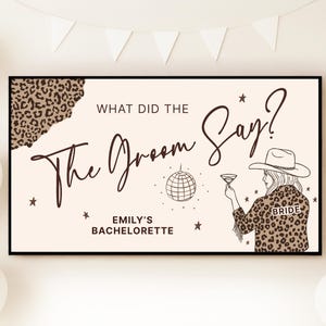 Peut inclure: Une affiche rectangulaire avec le texte "What Did The Groom Say?" dans une police élégante. L'affiche comprend un motif léopard, une illustration de boule disco et un dessin d'une femme portant un chapeau de cow-boy et tenant un cocktail. Le texte "Emily's Bachelorette" est également présent.