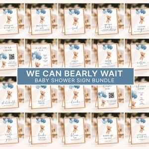 May include: A collection of twenty white rectangular baby shower signs displayed in gold frames. Each sign features a brown teddy bear holding a cluster of blue balloons and various text labels including Advice and Wishes, Mimosa Bar, and Diaper Raffle.