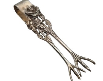 Small silver sugar tongs decorated with roses and chicken feet, accessory for sugar bowl, table service accessories, sterling silver, 1940.