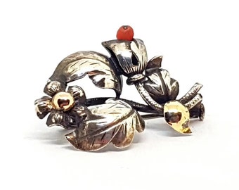 Antique coral brooch. Silver, gold and coral brooch. Bouquet of flowers. Circa 1950. Antique & vintage jewelry.Antique and vintage jewelry.