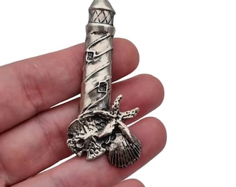 Vintage silver lighthouse brooch, pin with marine motifs, shell, sea star, gifts for lovers of the sea and navigation, circa 1970.