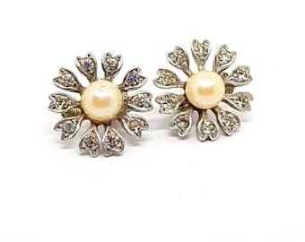 Pearl flower. Art deco silver, zirconia and pearl earrings. Circa 1950. Antique and vintage jewelry.