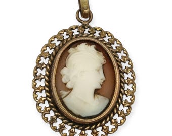 Cameo oval pendant in gold-tone metal with a relief of a female silhouette, circa 1950-60. Retro gifts for women, Vintage jewelry.