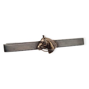Vintage 1950s silver equestrian tie clip with embossed horse head. Retro gifts, Antique and Vintage jewelry.