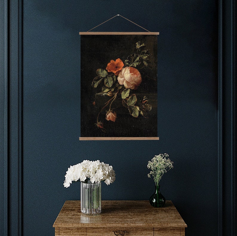 Dark and moody vintage floral painting stilll ife featuring pink and red roses.