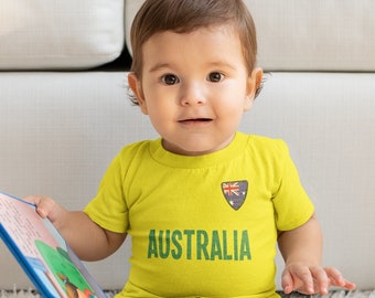 BABY o Kids AUSTRALIA Football T-shirt, nome e bandiera Petto Badge Cotone organico, Boys Girls Sustainable Gift