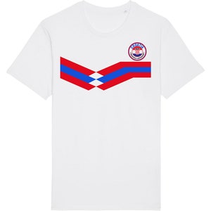 May include: White t-shirt with a red, white, and blue chevron design and a circular logo with the text "Croatia" and a checkered pattern.