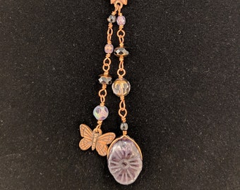 Paarse Amethyst en koperen vlinder ketting