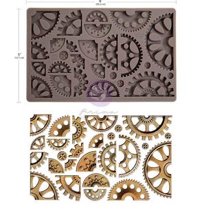 May include: A grey silicone mould featuring assorted gear designs, measuring 20.3 cm by 12.7 cm. Below, a sheet of gold-coloured gear stickers is displayed. The Prima logo is visible.