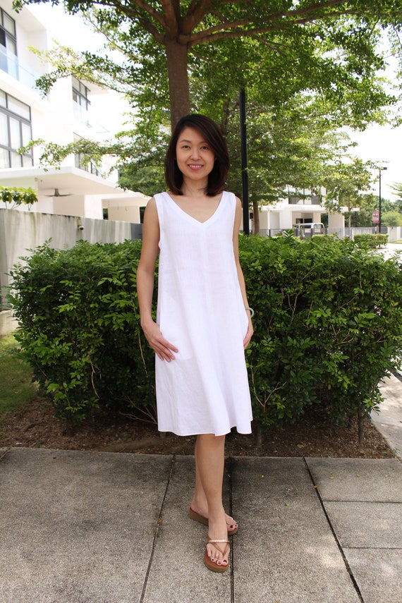 White sleeveless swing dress cheap