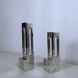 Pair of Brutalist Style Aluminum Candle Holders