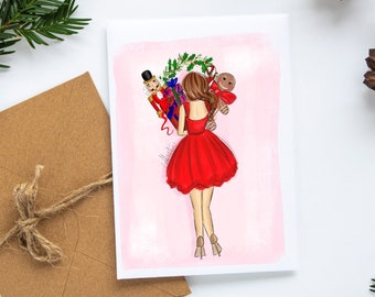 May include: A Christmas-themed greeting card featuring an illustration of a person in a red dress carrying gifts, a gingerbread man, and a nutcracker. The card is on a white background, with a brown envelope and pine needles.