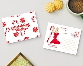 Puede incluir: Dos postales blancas con diseños de bastones de caramelo y menta roja. Una postal tiene el texto "Christmas Wishes" y la otra presenta a una mujer con un vestido rojo con un bastón de caramelo. También se ven una taza de café y galletas.
