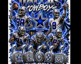 May include: A graphic print featuring four skeleton football players in white and blue uniforms with the text Dallas Cowboys and AT&T Stadium. The design includes a large blue star, lightning bolts, and five championship rings at the bottom.