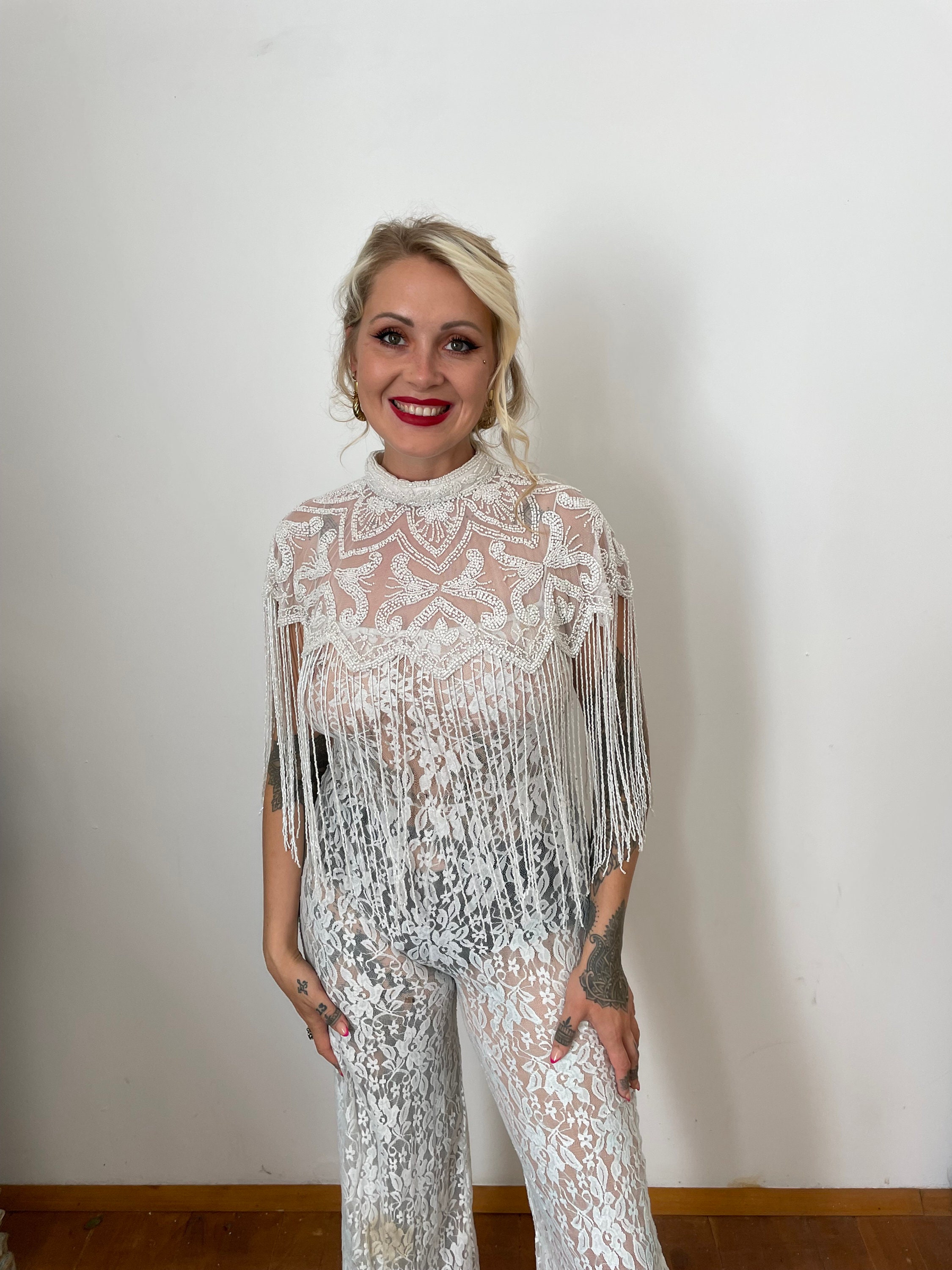 White beaded cape