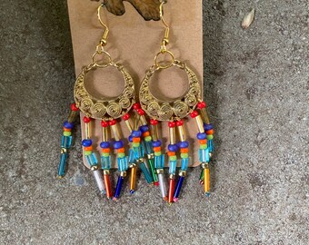 Mixed colors of beads attached to a pretty, ethnic looking earring top. Light weight and summery!