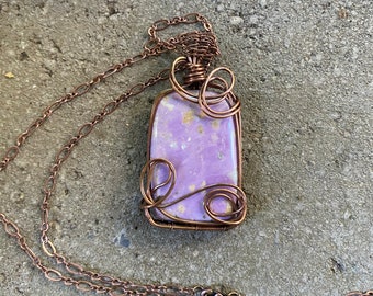 Phosphosiderite wire wrapped pendant, wrapped and woven with 99.9% pure copper wires and hung from copper plated chain.