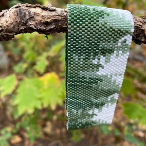 Cuff bracelet using 11/0 Delica beads and peyote stitch. Lovely scene of conifer forrest. Pattern purchased from BeadingWithBugs. image 4