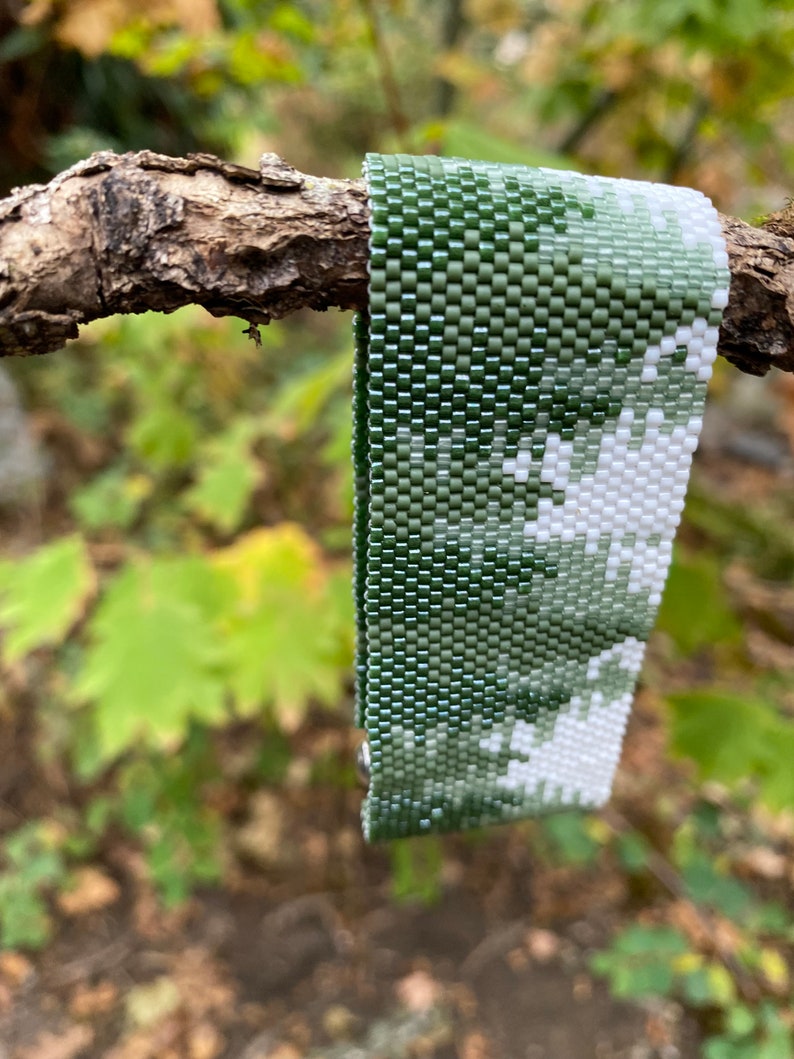 Cuff bracelet using 11/0 Delica beads and peyote stitch. Lovely scene of conifer forrest. Pattern purchased from BeadingWithBugs. image 4