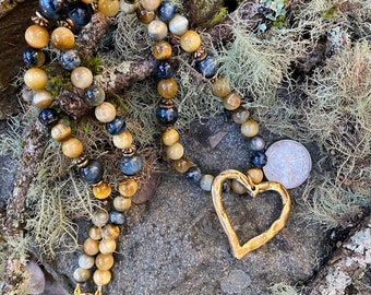 Heart pendant with lovely golden and blue Tiger's Eye beads in various sizes.