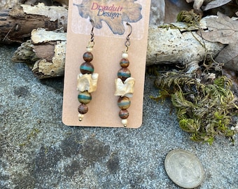 Snake vertebrae and Tibetian agate beads with bone accents on hypo allergenic French ear wires.