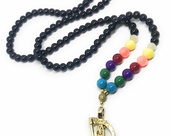 Holy Death’s 7 powers necklace rosary style. Collar 7 potencias de la Santa Muerte estilo rosario.