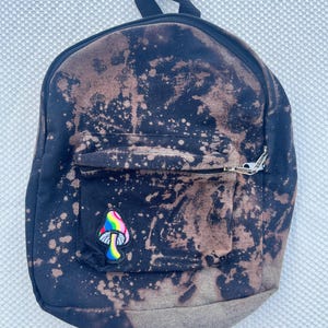 miniryggsäck med omvänd rågfärg och svamplapp