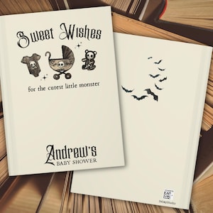 May include: Off-white baby shower invitation with the text "Sweet Wishes" and "for the cutest little monster." The front features a skull-themed onesie, stroller, and teddy bear. The back has a bat design. The invitation is for Andrew's baby shower.