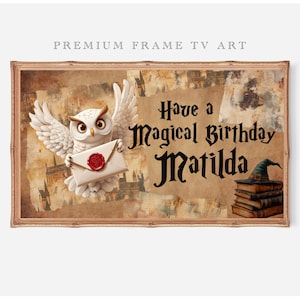 May include: A framed digital art print featuring a white owl holding a letter with a red wax seal. The artwork has a vintage parchment background with the text "Have a Magical Birthday Matilda". A wizard hat and books are also visible.