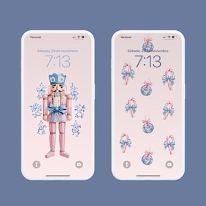 May include: Two iPhone screens displaying different Christmas-themed wallpapers. The left screen features a pink and blue nutcracker doll on a pink background with snowflakes. The right screen features a pink background with a repeating pattern of blue and pink candy canes and ornaments. Both screens display the time 7:13 and the date "Sábado, 23 de noviembre".