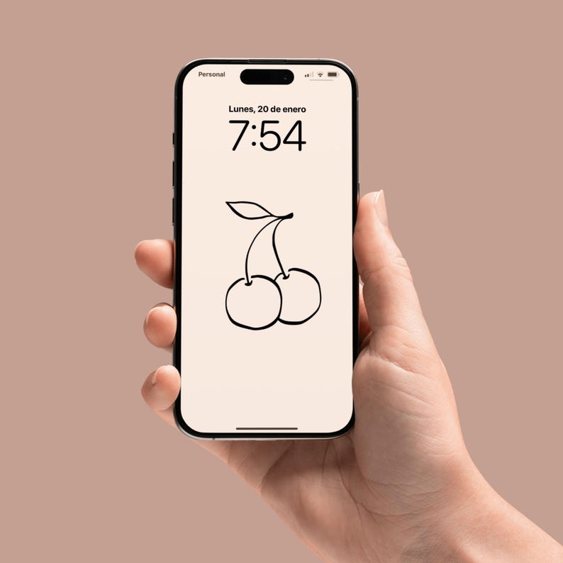 May include: A smartphone displaying a digital clock with the time 7:54 and the date Lunes, 20 de enero. The background of the phone screen is white with a black line drawing of two cherries.