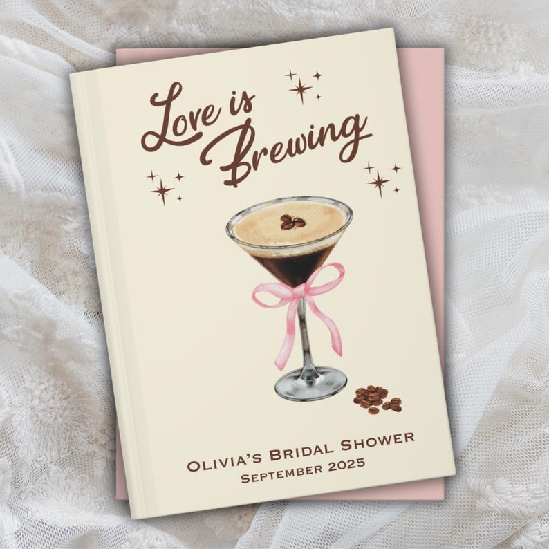 May include: A cream-colored invitation with the text "Love is Brewing" in brown script. It features a watercolor illustration of a coffee cocktail with a pink ribbon and coffee beans. The text "Olivia's Bridal Shower September 2025" is at the bottom.