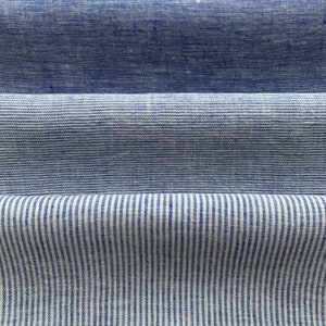 Tessuto di lino leggero in melange blu, strisce, gessato. Larghezza 150 cm / 59 ", peso 165gr / m2. Tessuto per abbigliamento