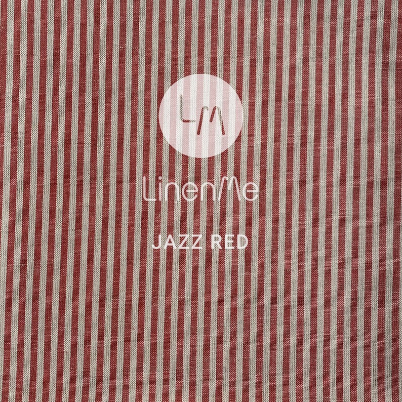 May include: Red and white striped fabric with the text "LinenMe" and "JAZZ RED" printed on it.