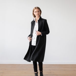 Linen coat Fabio in black heavy linen. Washed and soft linen coat with pockets and buttons. Long linen jacket available in 5 linen colors
