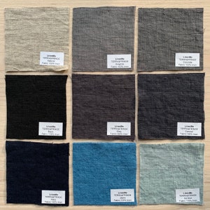 May include: Nine fabric swatches in various colors, including natural, graphite, concrete, black, grey, charcoal, navy, jeans, and ice blue. Each swatch has a label with the text "LinenMe TERRA&FRINGE" and the color name, along with the fabric type, "Fabric: 100% linen".