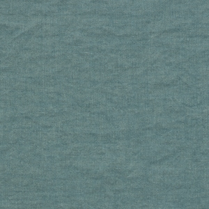 May include: A close-up of a textured, blue fabric. The fabric has a subtle woven pattern.