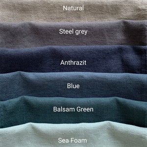 May include: A collection of eight fabric swatches in various colors, including white, silver, natural, steel grey, anthrazit, blue, balsam green, and sea foam.