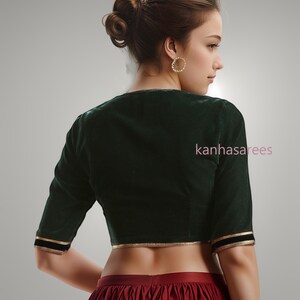 Designer ethnic blouse in green velvet with golden gota lace detailing, perfect for pairing with sarees and lehengas