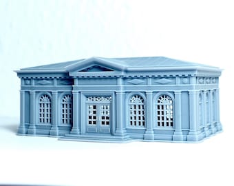 May include: A light blue miniature building with a classical architectural design. The model features arched windows, columns, and a detailed roof. The building has a symmetrical facade with a central entrance.