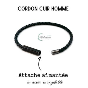 May include: Black leather bracelet with a magnetic clasp. The clasp is made of stainless steel and has the words "Atelier Valentine" engraved on it.