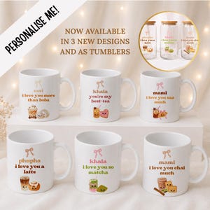 May include: Six white ceramic mugs featuring personalised names, pink bow illustrations, and cute food graphics with text including 'I love you more than boba', 'you're my best-tea', 'I love you saa much', 'I love you a latte', 'I love you so matcha', and 'I love you chai much'.