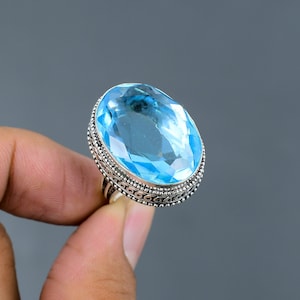 Facettierter Schweizer Blautopasring: Handgemachter 925er Silberring