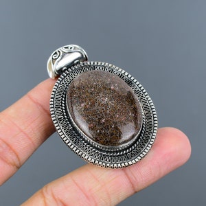 Dinosaur Bone Pendant: Oval Gemstone, 925 Sterling Silver, Handmade
